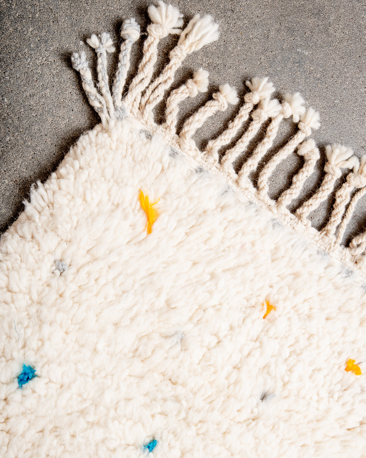 Modern, designer, handcrafted Berber rug from Morocco. Beniourain carpet with beautiful colours and patterns and fluffy wool texture.
